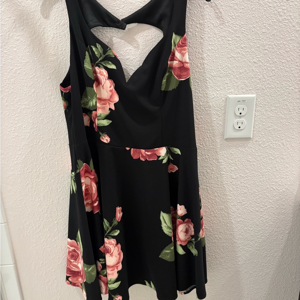 B. Smart Black Dress with Pink Floral Design